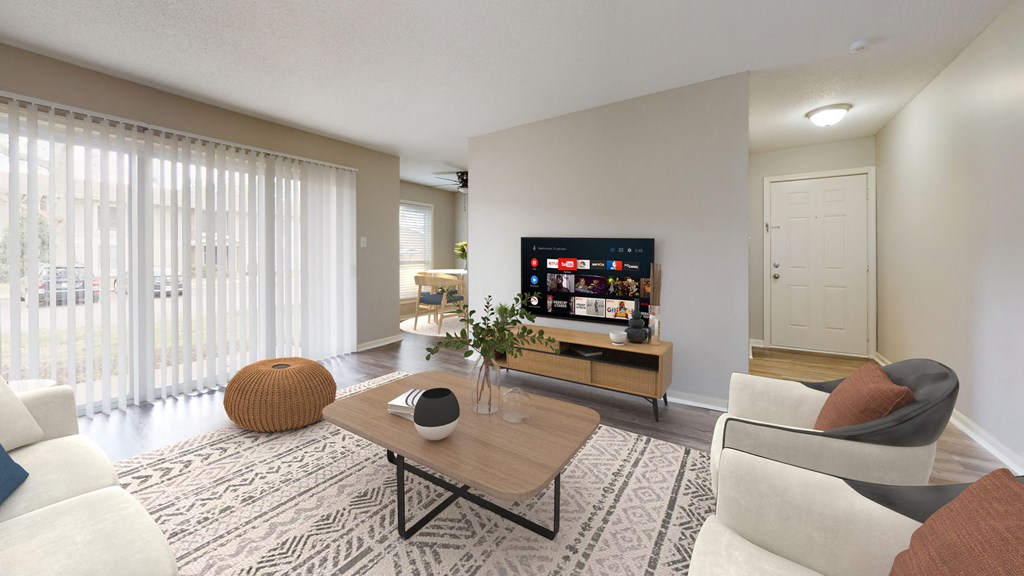 Living room with a couch and a coffee table and a television at Summit at Keystone, Indianapolis, IN