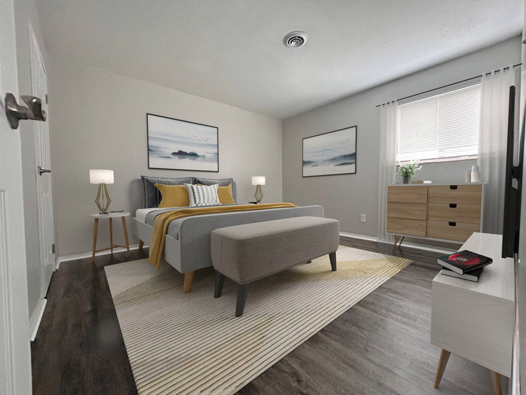 a bedroom with a bed and a dresser and a window