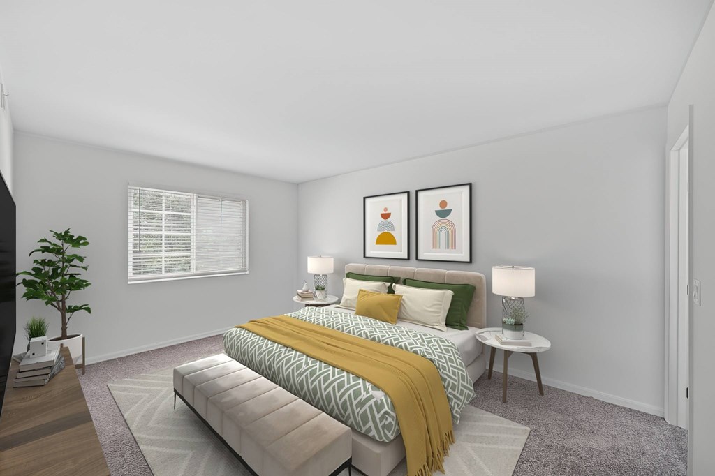 A bedroom with a bed, two lamps, a bench, and a potted plant.