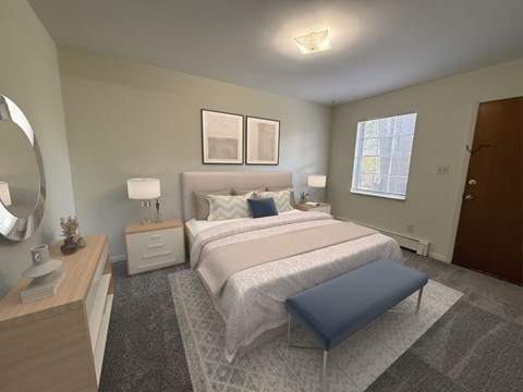 A bedroom with a large bed and a blue ottoman.