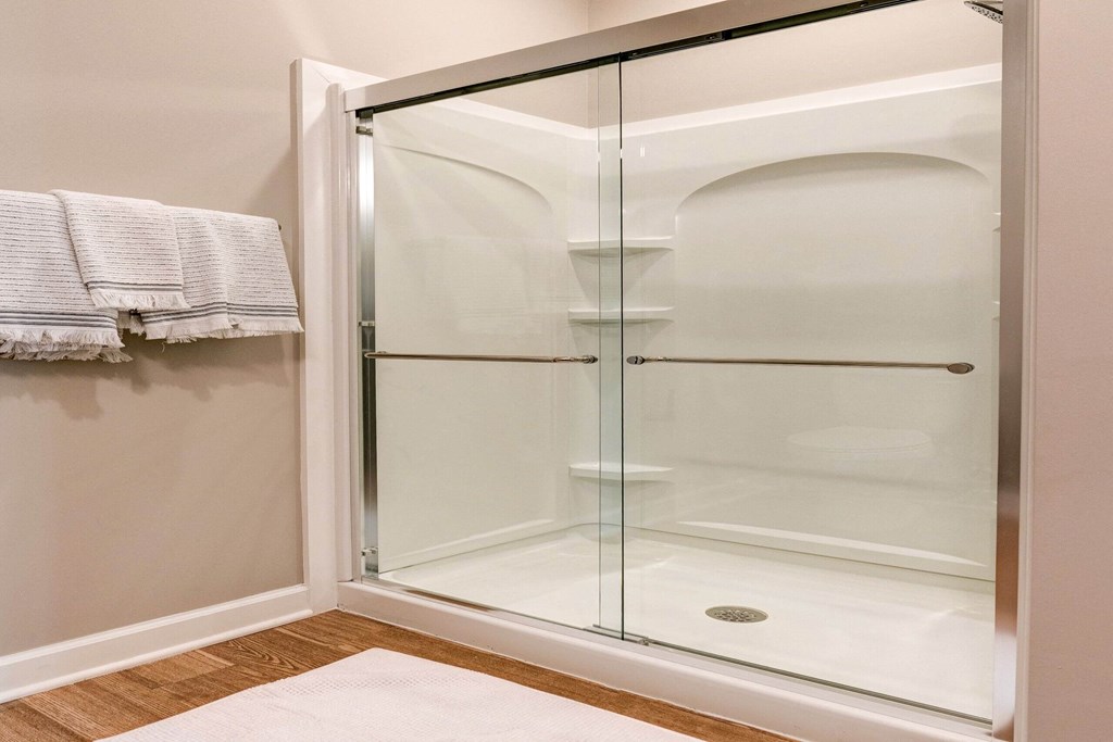 a shower with a glass door in a bathroom at Adelphi Quarter, Columbus, 43203