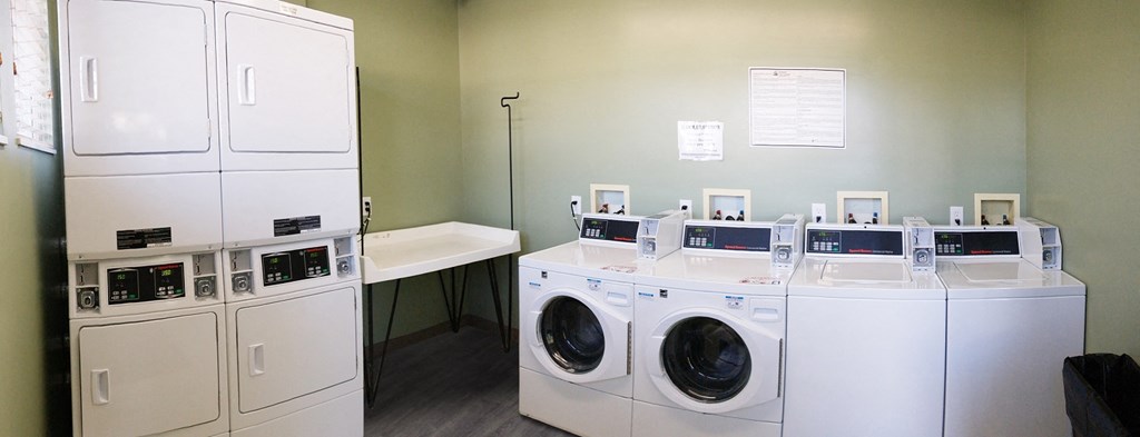 A laundromat with washers and dryers.