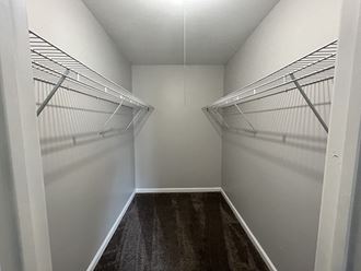 a spacious walk in closet at the historic electric building in fort worth, tx - Photo Gallery 5