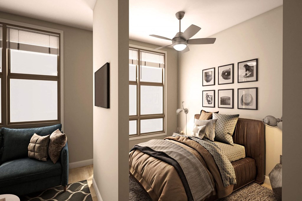 a bedroom with a bed and a ceiling fan at Adelphi Quarter, Columbus, Ohio