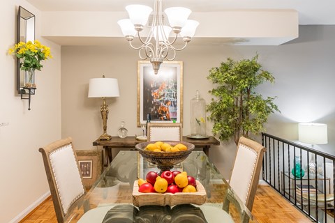 Dining room with a glass table with fruit on it at Indian Creek Apartments, Cincinnati, 45236