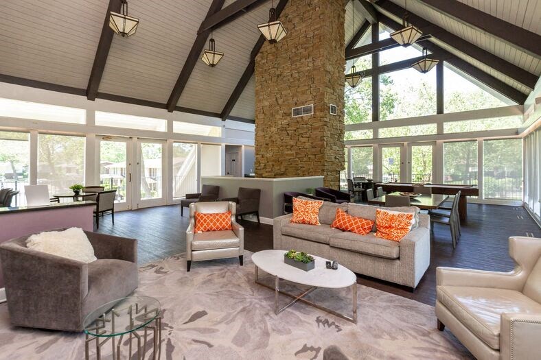 Living room with couches chairs and a coffee table at Summit at Keystone, Indianapolis, 46220