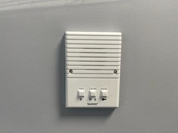 Light switch on a gray wall at Tall Timber Apartments, Cincinnati