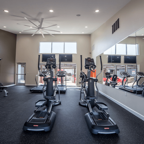 cardio equipment in the gym at the district flats apartments in lenexa
