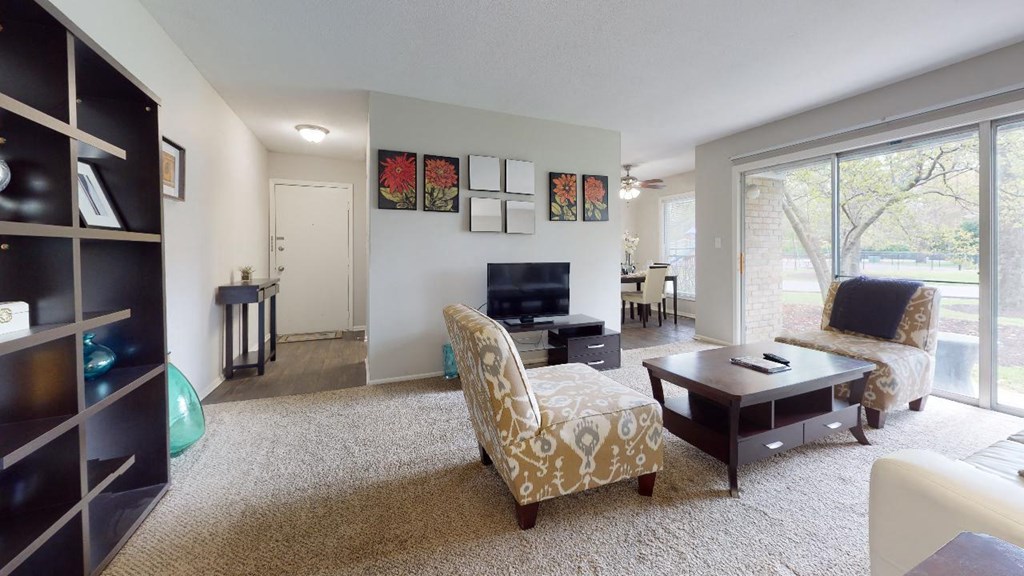 Living room with a couch and a table at Summit at Keystone, Indiana