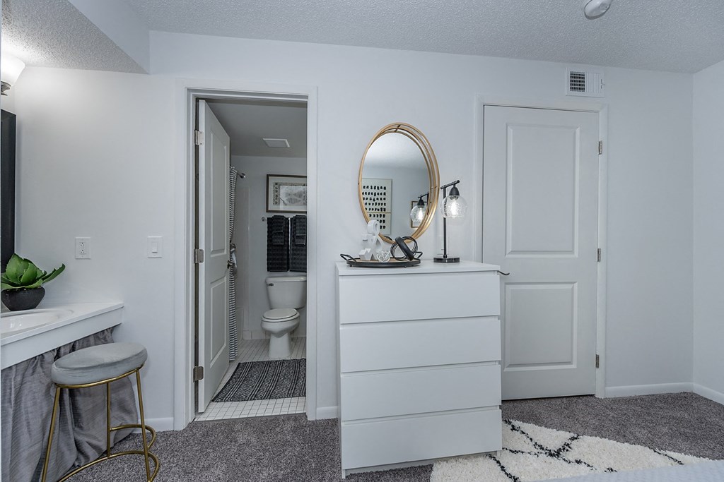 Bedroom interior with new grey carpet at Sandhurst Apartments, Ohio