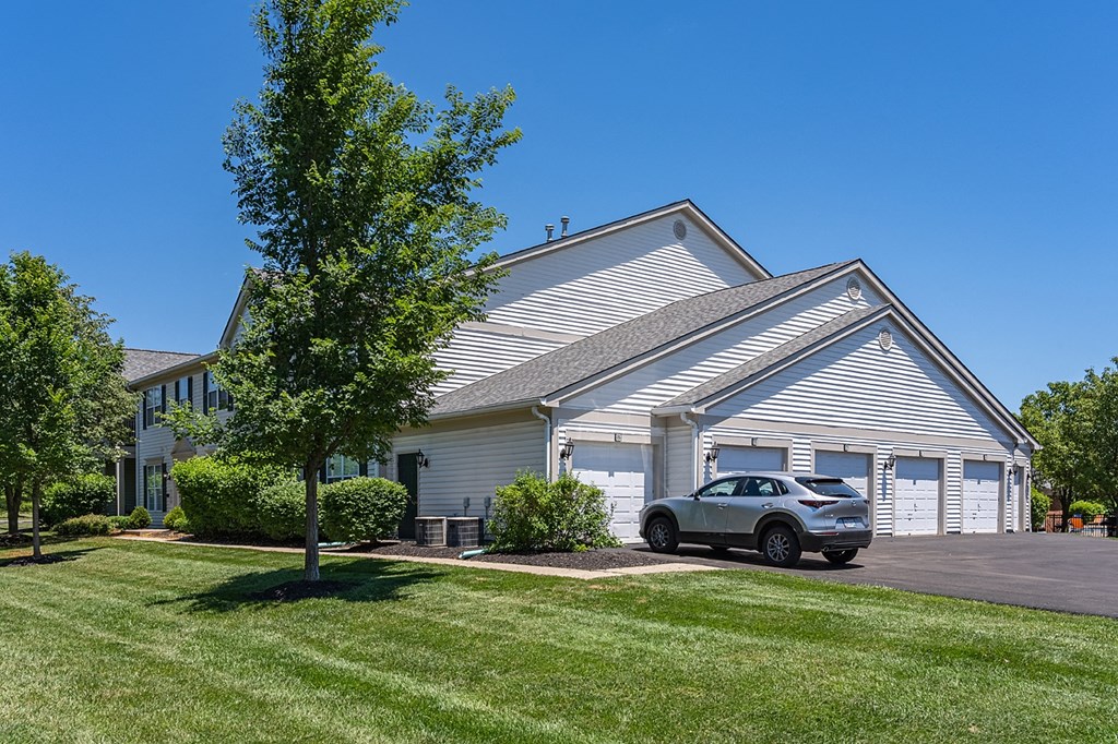 a white house with a car parked outside at Bishops Gate, Ohio, 45249