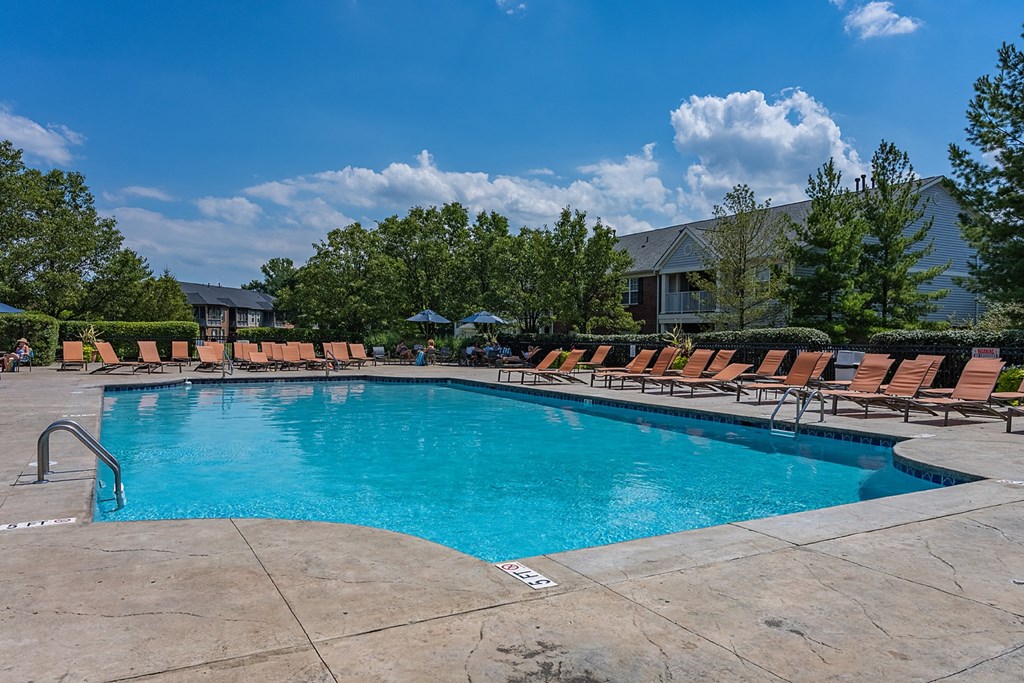 our resort style pool is filled with lounge chairs and a blue sky at Bishops Gate, Ohio, 45249