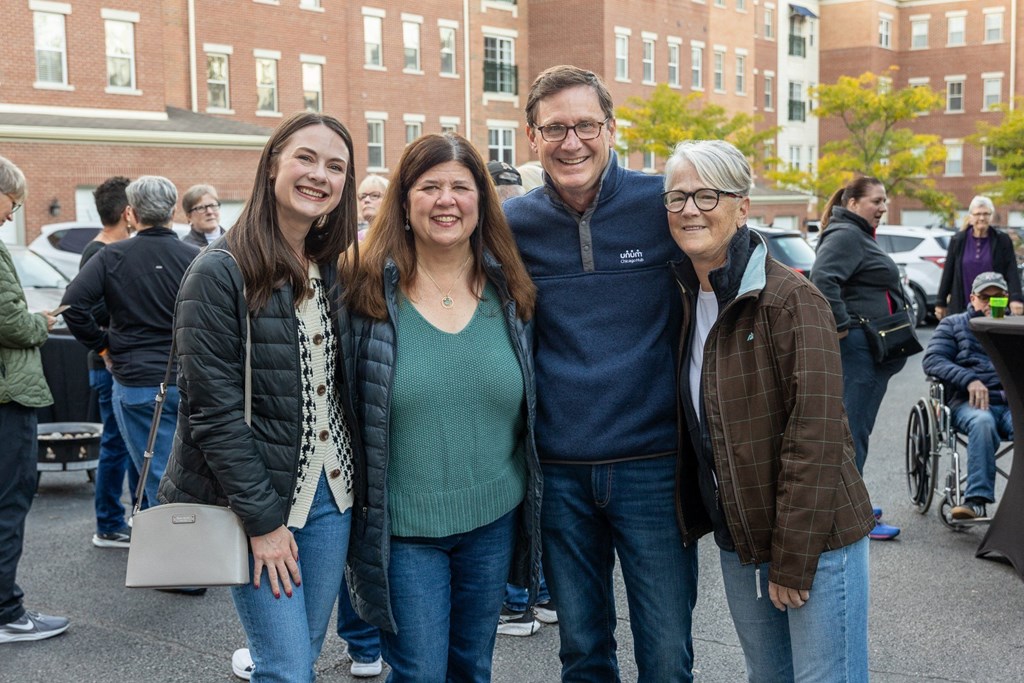 a group of people pose for a picture