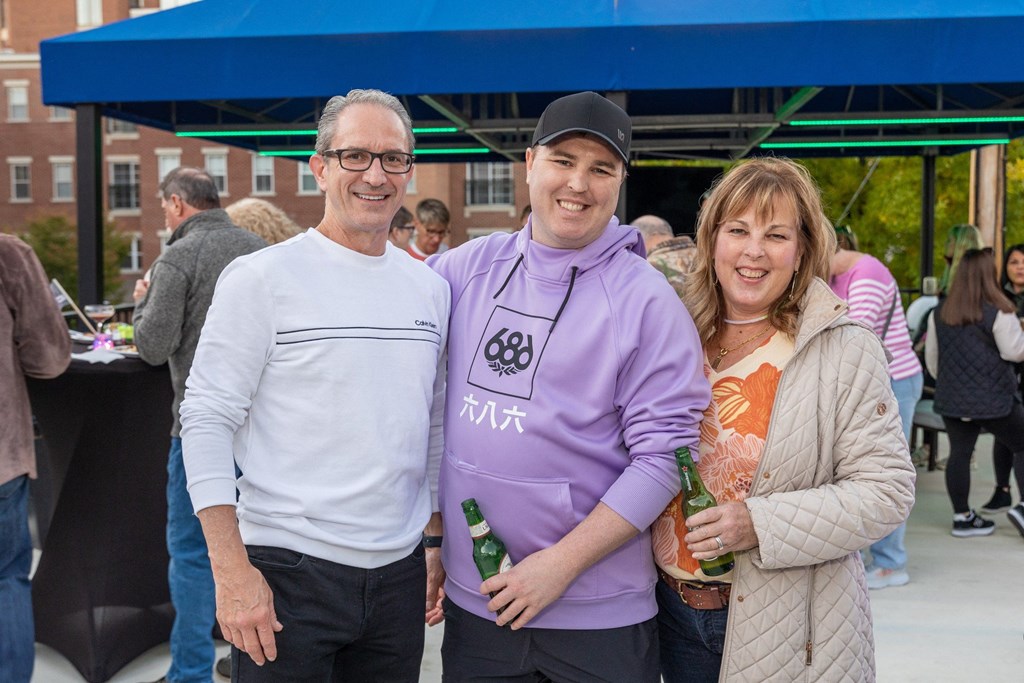a group of people posing for a picture at an event