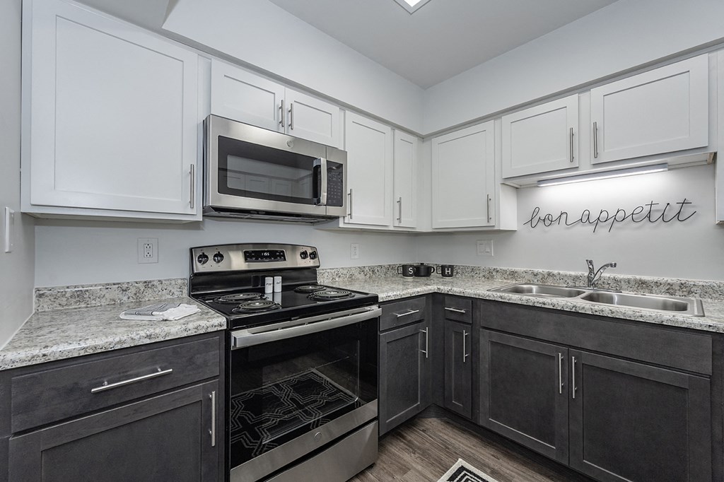 Kitchen appliances and cabinets at Bloomfield Apartments, Dayton