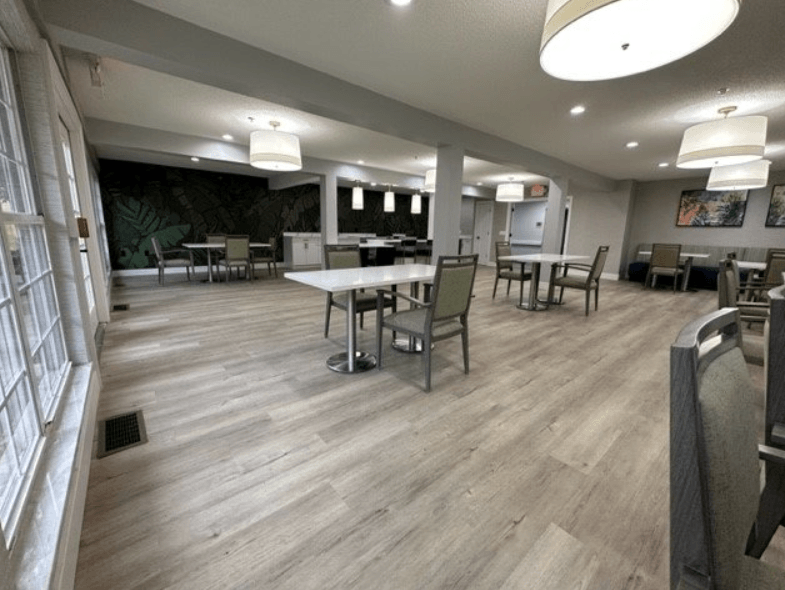 a large room with tables and chairs