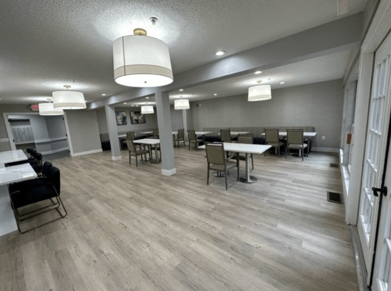 a large room with tables and chairs