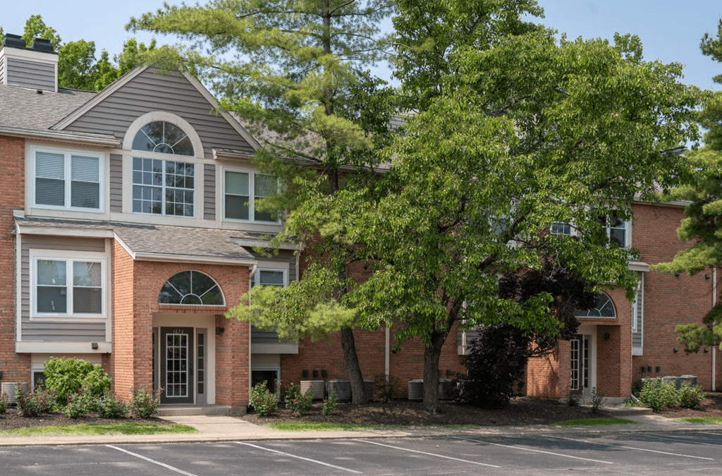 Large brick apartment complex with trees in front of itat Indian Lookout, West Carrollton