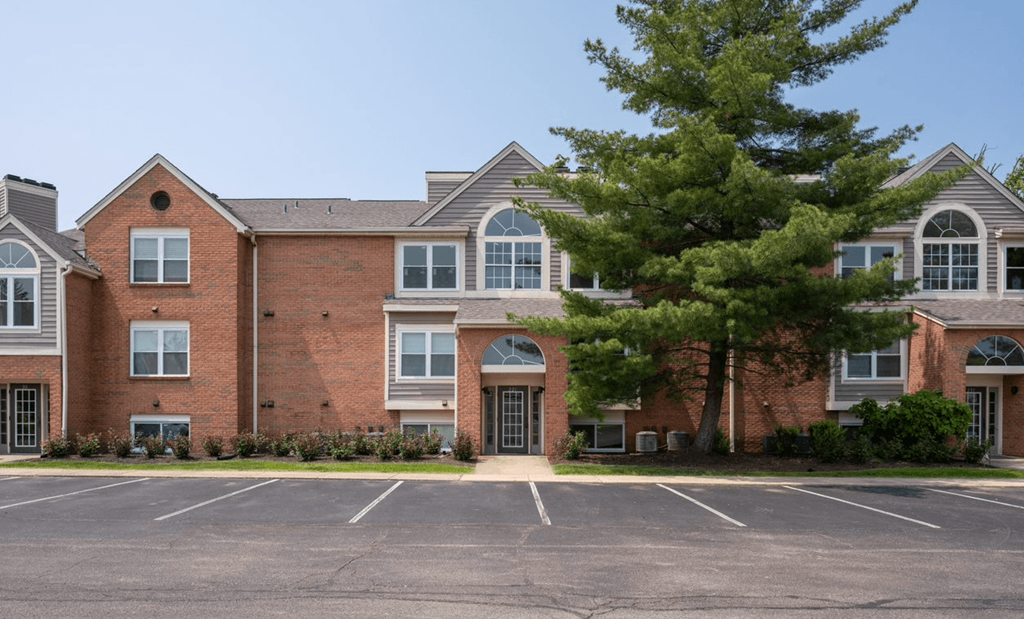 Large brick building with a large parking lot in front of it  at Indian Lookout, Ohio, 45449