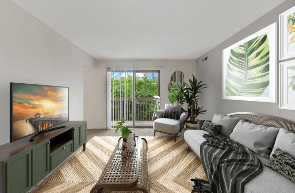 a living room with grey walls and a sliding glass door leading to a balcony at The Woodridge Collection, Fairfield