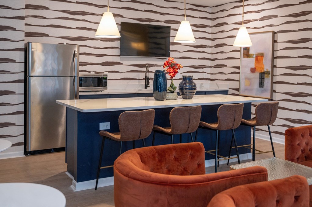 a group of wine glasses and a display of chandeliers at Monmouth Row Apartments, Newport, KY