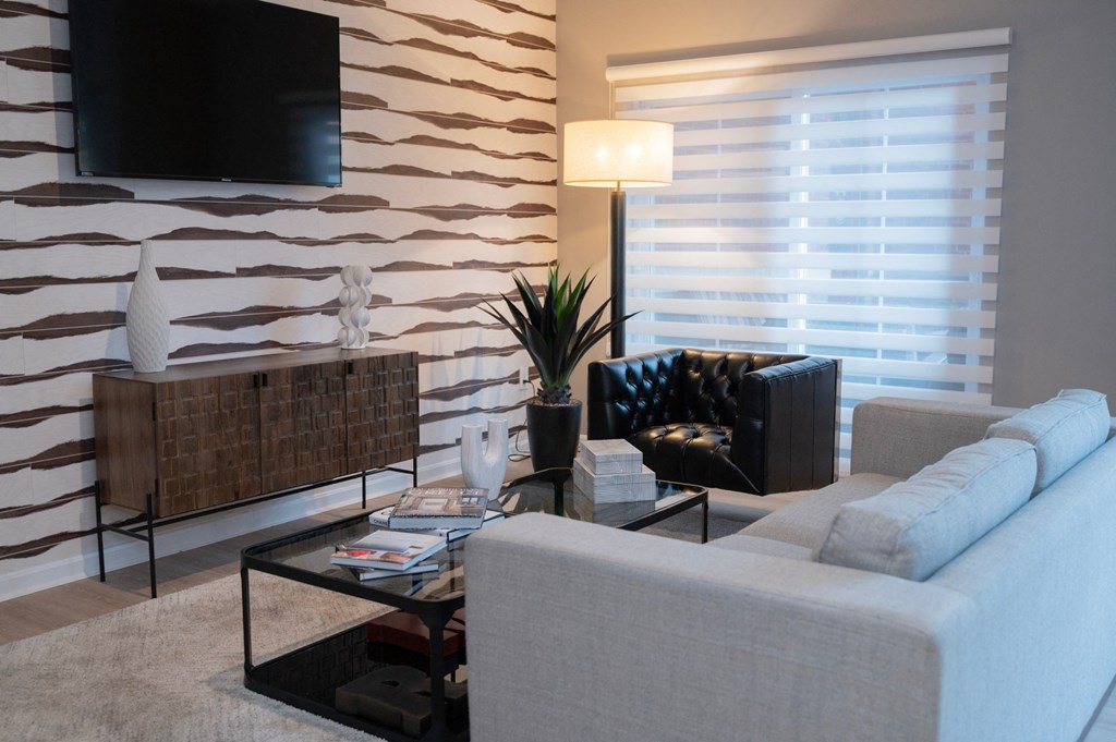 a living room with a couch and a coffee table at Monmouth Row Apartments, Kentucky