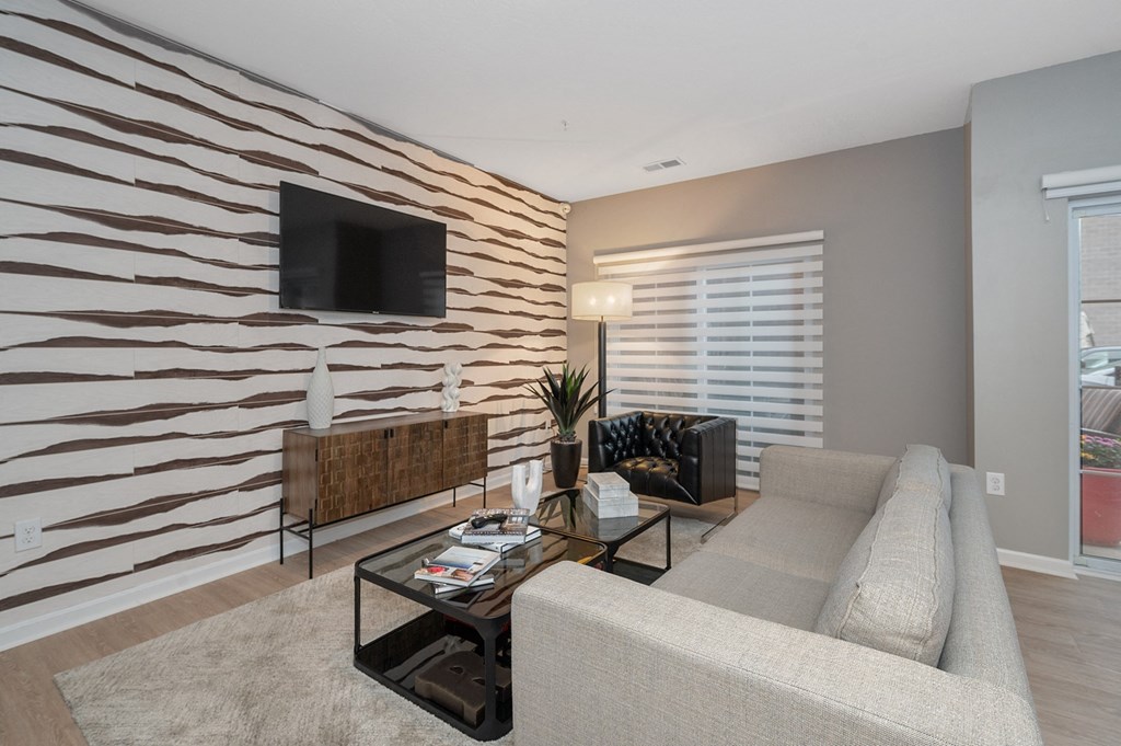a living room with a couch and a coffee table at Monmouth Row Apartments, Newport, 41071