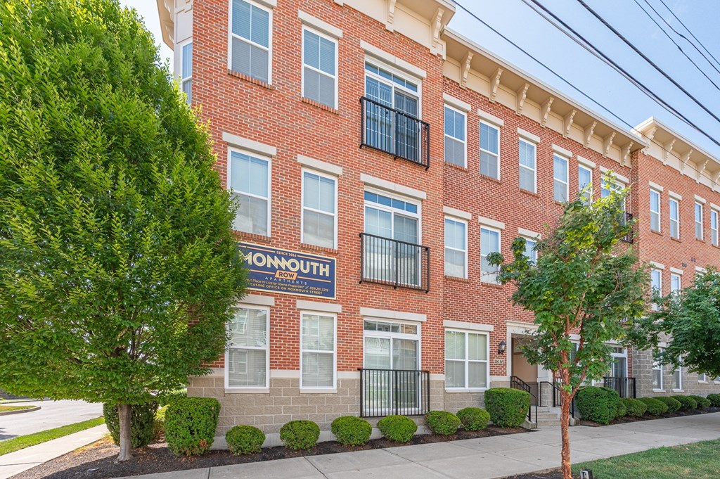 A red brick building with the word Monmouth on it.