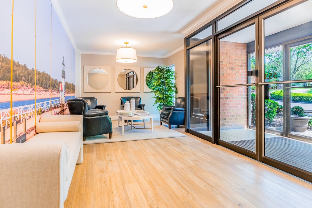 loft room with wooden floor black couch daytime outside at Indian Creek Apartments*, Ohio, 45236