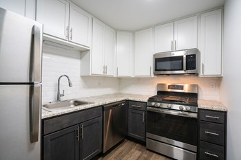 Kitchen appliances and cabinets at Stonecrest Apartments, Ohio - Photo Gallery 20