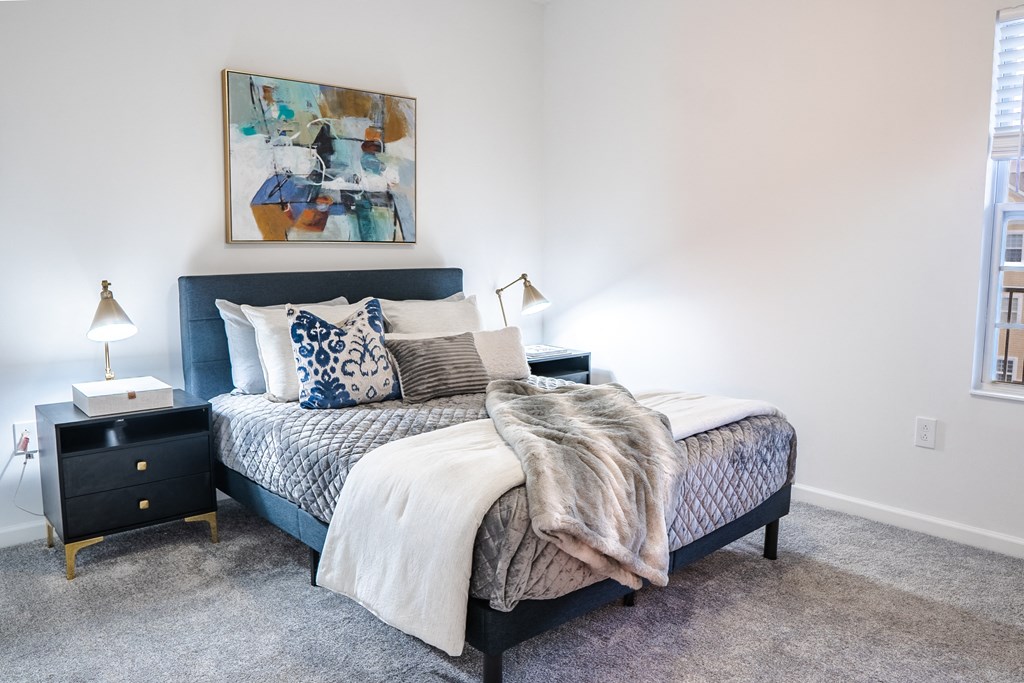 a bedroom with a bed and two nightstands  at Waterstone Landing, Ohio, 43551