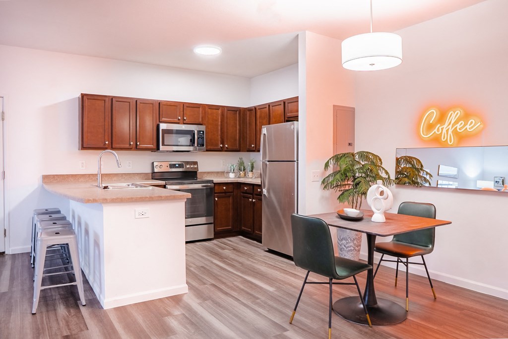 a kitchen and dining area in a 555 waverly unit  at Waterstone Landing, Perrysburg, Ohio