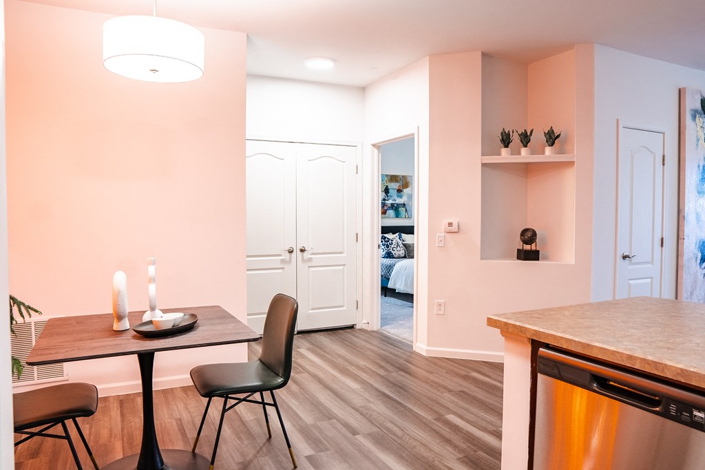 a dining area with a table and chairs  at Waterstone Landing, Perrysburg, OH