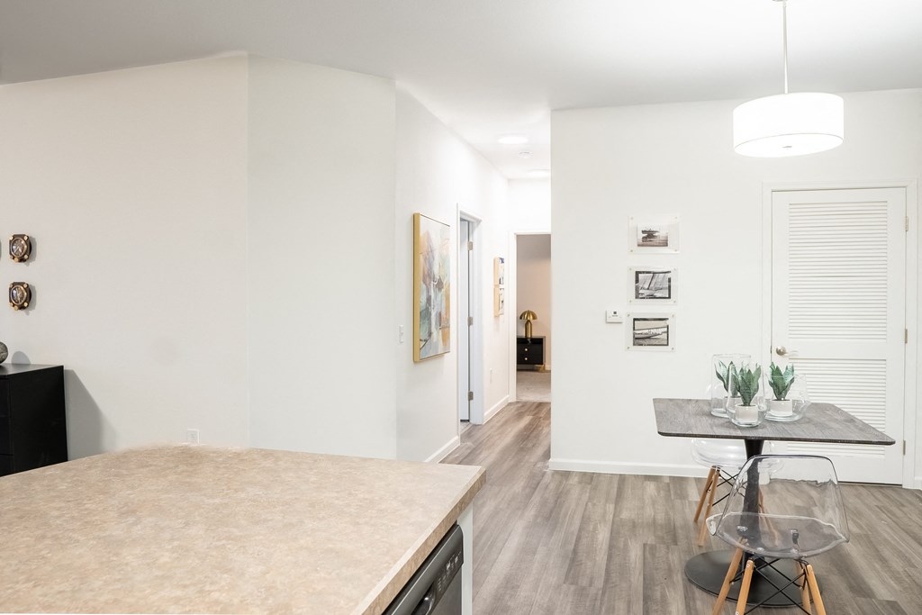 a kitchen and dining area in a 555 waverly unit at Waterstone Landing, Ohio, 43551