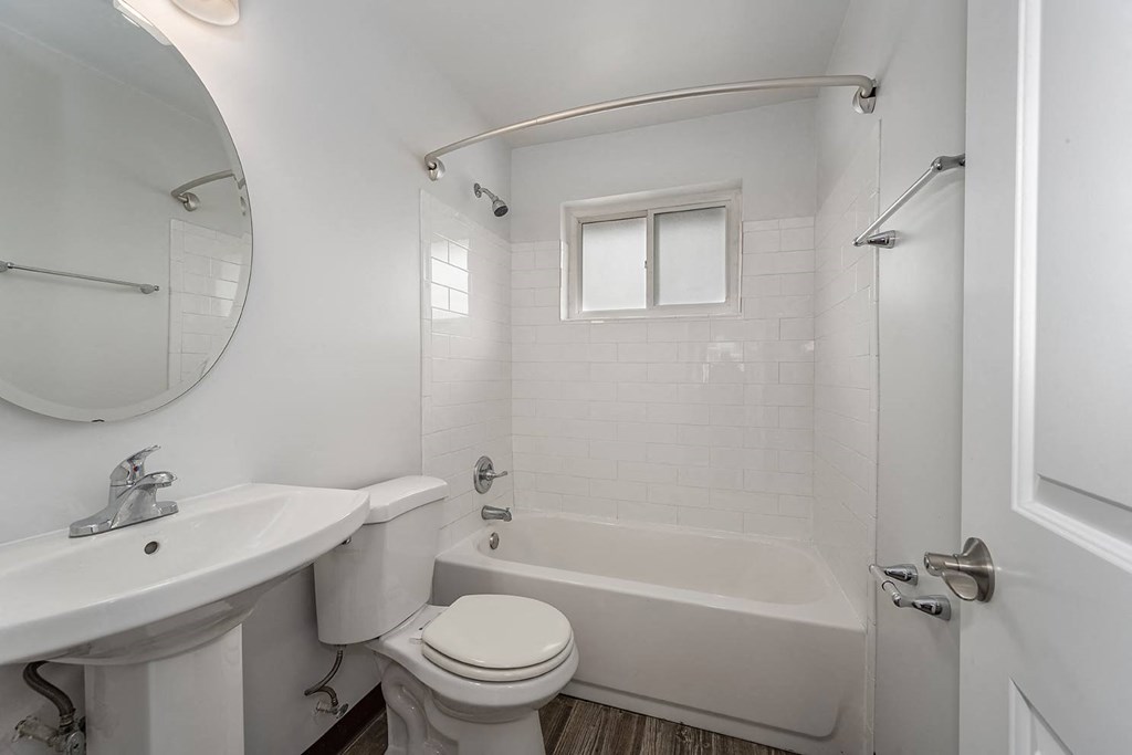 Fernview floor plan-renovated-new bathroom-tub,tile,sink, toilet