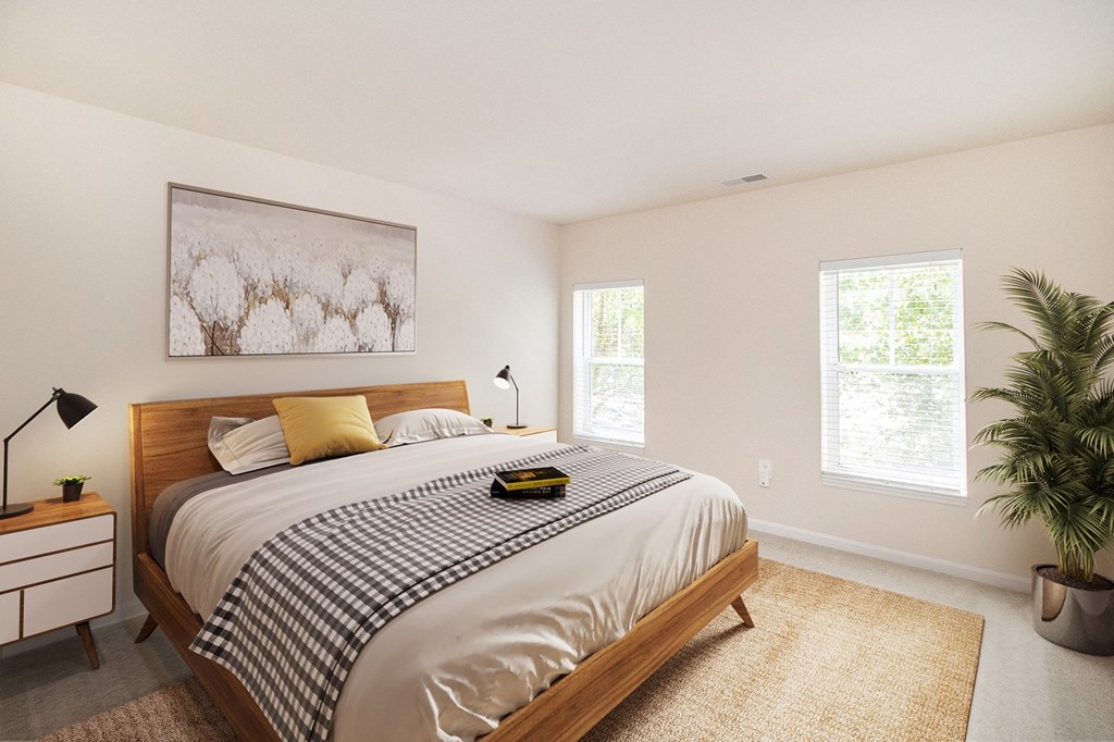 the retreat guest bedroom with white walls and a large bed