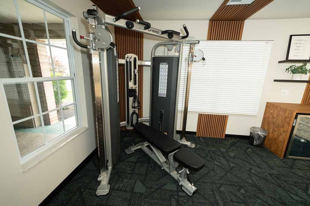 Gym with exercise equipment and a window at Honey Creek, Greenwood, IN