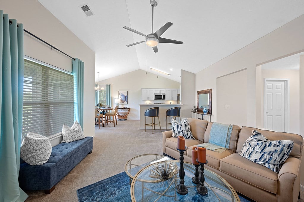Living room with a couch and a table at Four Bridges, 45044-8380