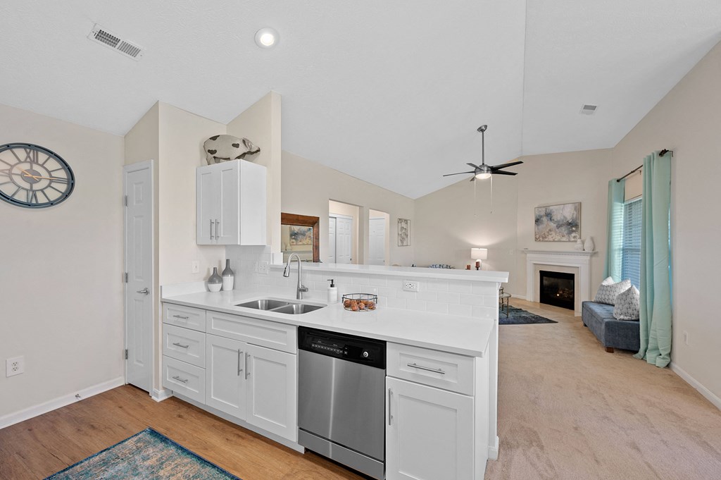 White kitchen with a sink and a dishwasher at Four Bridges, Liberty Township, OH, 45044-8380