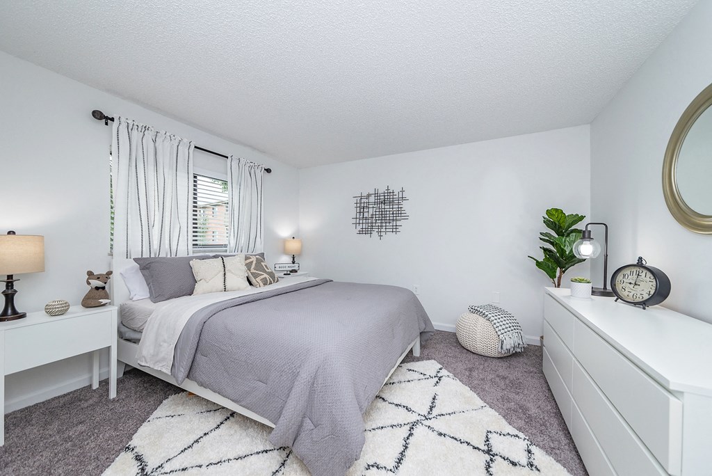 a bedroom with a bed and a dresser and a window at Weaver Farm, Florence, KY