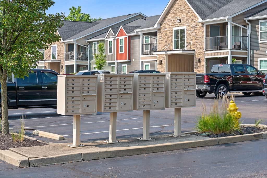 Street sign with mailboxes in front of a row of houses at Galbraith Pointe Apartments and Townhomes, Cincinnati, Ohio