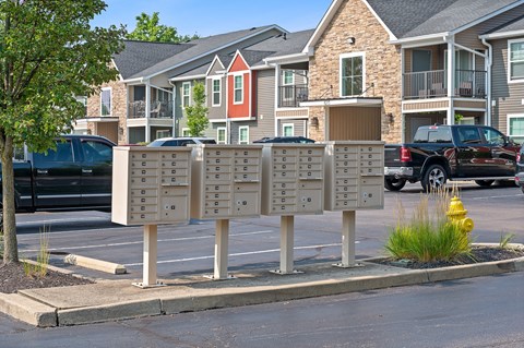 Street sign with mailboxes in front of a row of houses at Galbraith Pointe Apartments and Townhomes, Cincinnati, Ohio