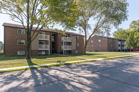 our apartments offer a spacious courtyard with trees at Crossings of Kenton, Erlanger, 41018
