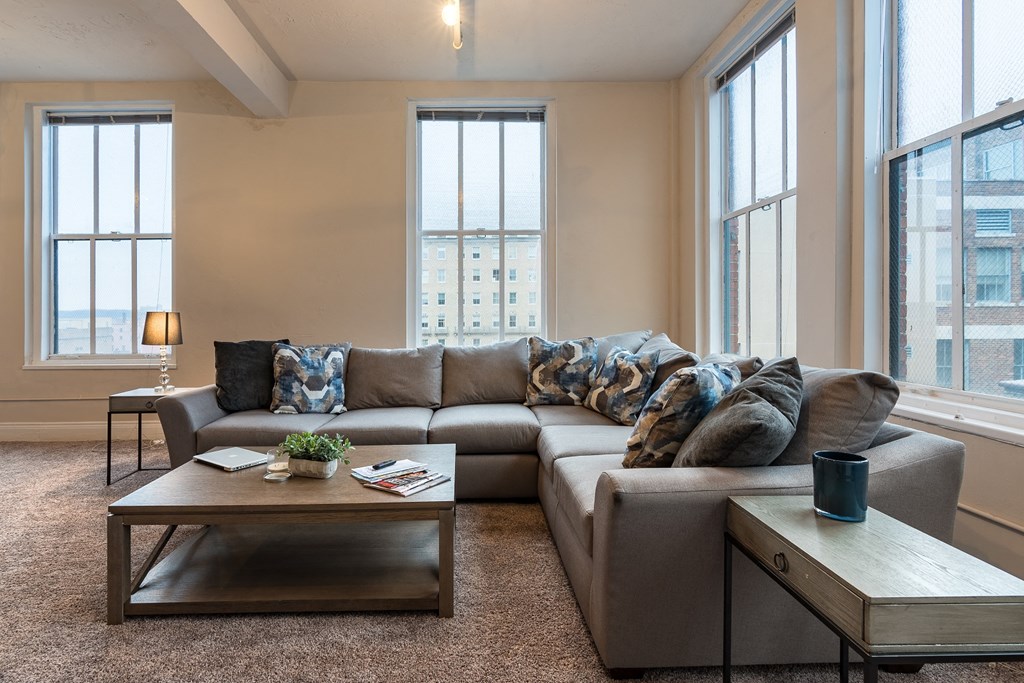 a living room with a couch and a coffee table