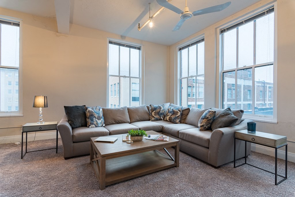 a living room with a couch and a coffee table