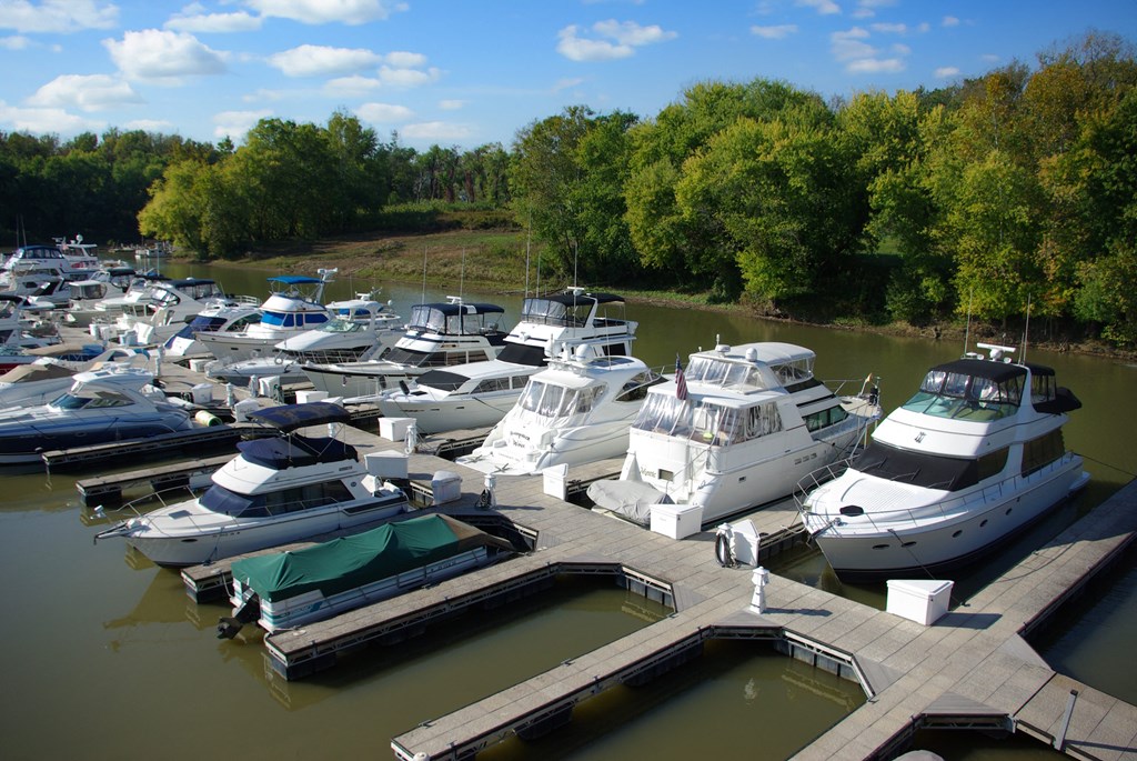 a marina full of boats parked at a dock