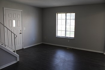 an empty room with a window - Photo Gallery 26