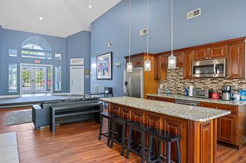 Large kitchen with granite countertops and wooden cabinets at Indian Lookout, Ohio, 45449