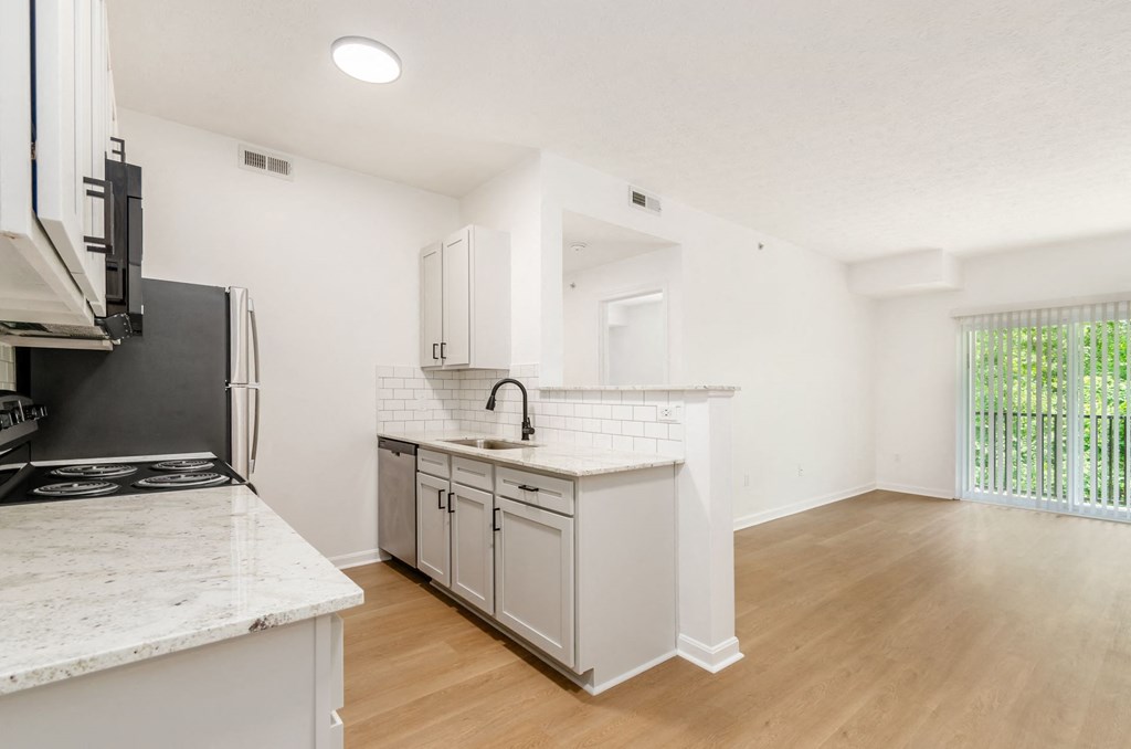 a kitchen with a counter top and a refrigerator at Prescott Place, Ohio, 43235