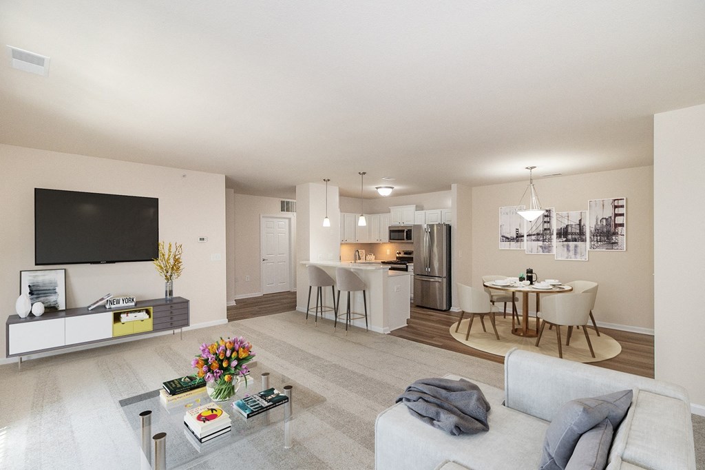 a living room with a couch and a table and a television